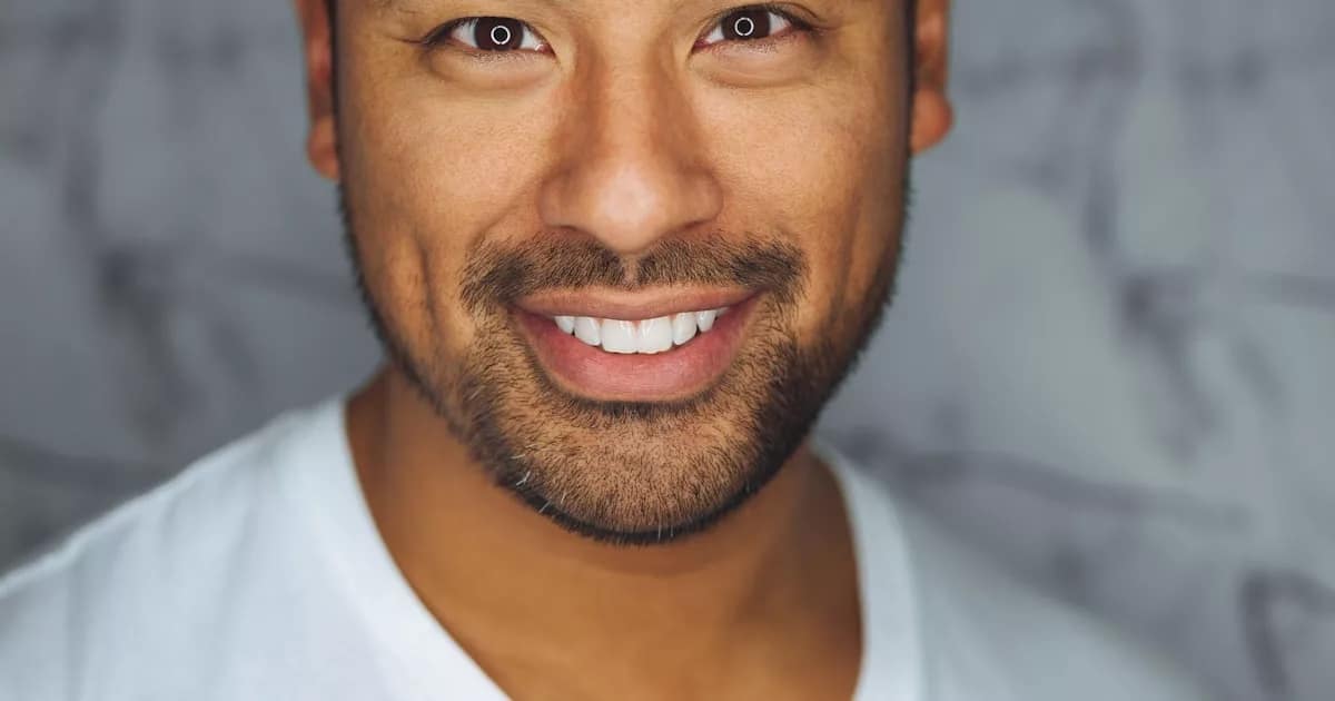 student learning laptop library