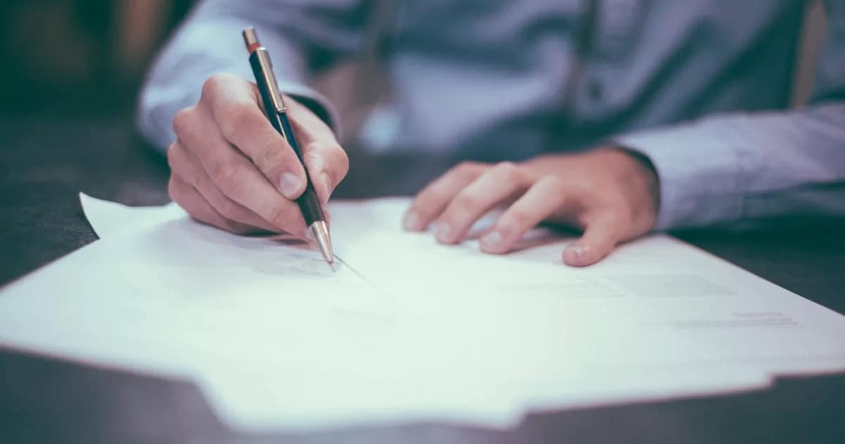 Occupancy paperwork for a holdover seller being signed before closing